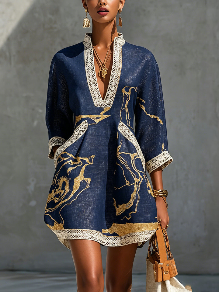 Donatella | Black minidress with golden marble print and crochet lace