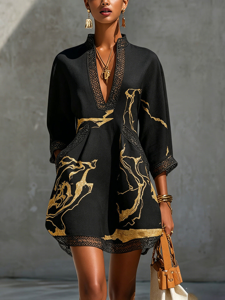 Donatella | Black minidress with golden marble print and crochet lace
